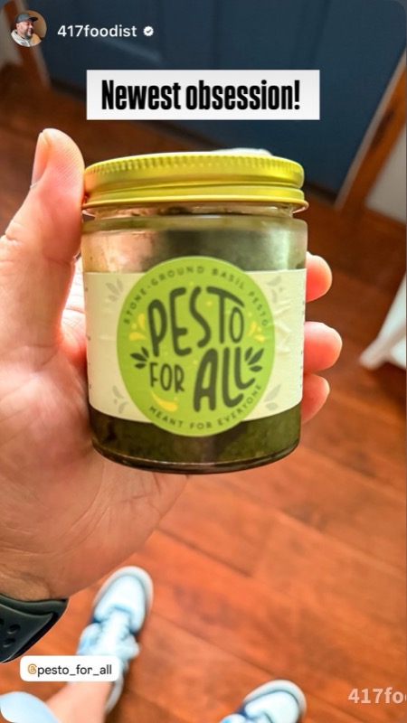 Instagram story of a hand holding a jar of Pesto For All stone-ground basil pesto