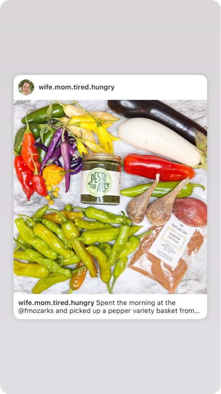 Instagram post showing a marble counter covered in market peppers and eggplant around a jar of Pesto For All